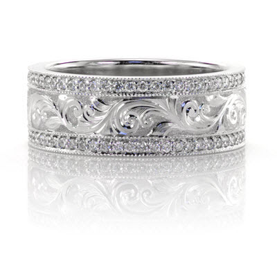 Hand Engraved Wedding Ring in platinum with bead-set diamonds.