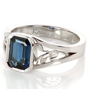Bezel Set Emerald cut blue sapphire engagement ring