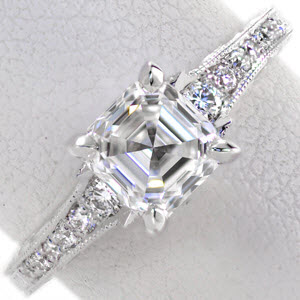 Engagement Ring with asscher cut diamond and unique band of hand engraving and filigree in Honolulu.