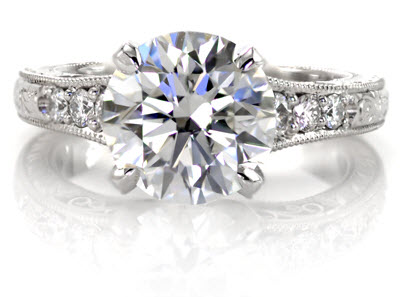 Micro Pavé Engagement Ring with a 2.20 carat diamond center stone. Shown in 950 Platinum Ruthenium and featuring 6 bead-set with milgrain diamonds.