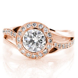 Halo engagement ring in Cleveland with bezel set center stone and milgrain detail.