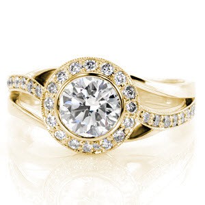 Hudson engagement ring with a bezel set round brilliant diamond and micro pave halo.