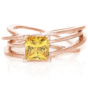 Design 1168 elegantly displays a 1.25 carat princess cut sapphire within four v-shaped prongs. Crafted in 14k white gold, the height of the multiple bands give the appearance of movement. The flow of the bands add interest which intensifies the vibrant hue of the natural yellow sapphire.