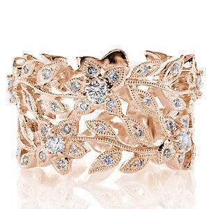 Las Vegas wide band in rose gold with nature inspired patterns and diamonds.