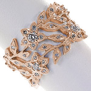 Rose gold wedding ring in Massachusetts with floral designs and micro pave diamonds.