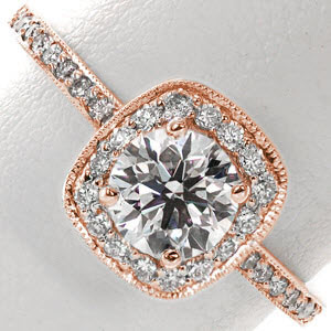 Rose gold halo engagement ring in Denver with round center stone and diamond band.
