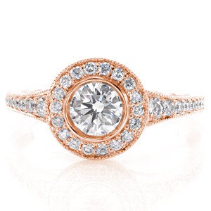 Rose gold engagement ring in Quebec City with diamond halo and round center stone.