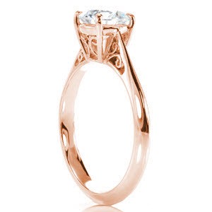 Rose gold engagement ring in Charlotte with filigree and round brilliant center stone.