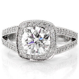 Buffalo engagement ring with cushion shaped halo and a diamond split shank band. 