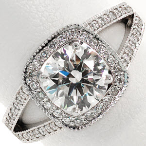 Des Moines cushion cut engagement ring with round center stone and split band.