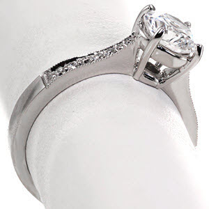 Diamond engagement ring in Cleveland with round brilliant center stone and milgrain edges.