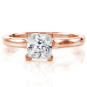 Sedona Solitaire is a modern engagement ring with the contemporary 1.00 carat princess cut center stone. The smooth polished cathedral contours up towards the diamond, giving the band dimension and style. The V-shaped chevron prongs protect the edges of this square diamond and adds an element of design. 