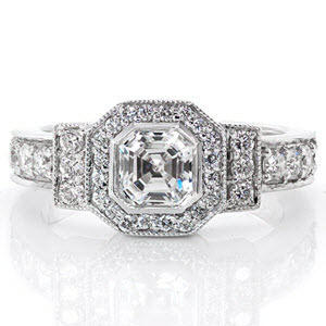 Asscher Art Deco is true to its era with the embellishment of micro pavé diamonds. The bold shapes of the octagon halo and rectangular side rails emphasize its historical style. A smooth bezel borders the 0.75 carat asscher cut to showcase the mirrored staircase facets of this linear design.       