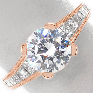 Rose gold engagement ring in Honolulu with round brilliant center stone framed by channel set princess cuts along the band.