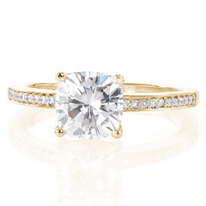 Memphis cushion cut engagement ring with diamond band in yellow gold.