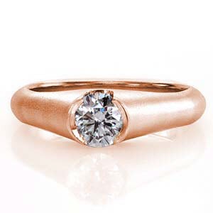 Design 1908 is a timeless solitaire with a contemporary twist. The domed band rises up to a cathedral, half-bezel setting. The vibrant scintillation of the 0.50 carat round brilliant cut center diamond stands out next to the matte finish of the metal band. 