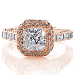This design combines the romance of multi-faceted stones with the sophistication of step-cut diamonds. The row of carrÃ© diamonds along the top of the band is a pleasing contrast to the accent of micro pavé stones. The radiant center is enhanced by a halo of diamonds to maximize its sheer size.   
