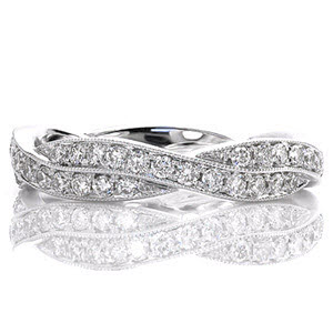 Fargo diamond band with a woven pattern and bead set diamonds.