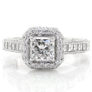 This stunning micro pavé ring contains a 0.75 carat princess cut center stone enveloped in a double row diamond halo. The channel set carrÃ© cut side stones add a linear balance to the diamond sparkle visible on all sides. The design has hidden filigree curls on the inside for extra decadence. 