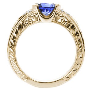 Filigree engagement ring in Kansas City with blue sapphire center stone, hand engraving and filigree.
