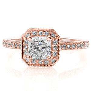 Our Radiant Amante design features a four prong 0.75 carat center diamond. The design illuminates with a clipped corner halo design and micro pavé diamonds. The diamonds continue along the delicate band for additional dazzle. The perfectly raised shoulders allow for a wedding band to sit close. 