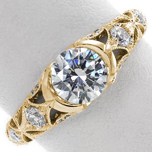 Madison wedding ring with ornate patter, half bezel center stone and milgrain detail.