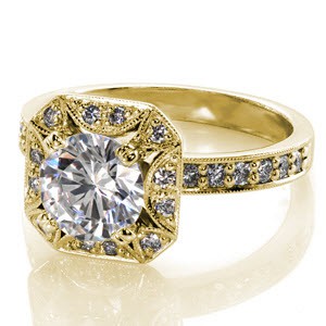 Antique inspired custom engagement ring in Rochester with a unique pierced diamond halo surround the round diamond center stone.