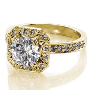 Antique inspired custom engagement ring in Grand Rapids with a unique pierced diamond halo surround the round diamond center stone.
