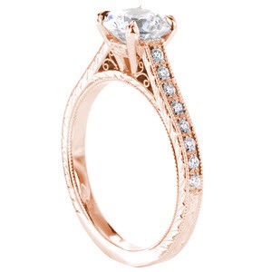 Honolulu rose gold engagement ring with round center stone, filigree and diamonds.