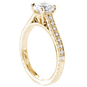 Antique engagement ring in Oakland featuring a yellow gold setting with scroll filigree, hand engraving and micro pave diamonds.