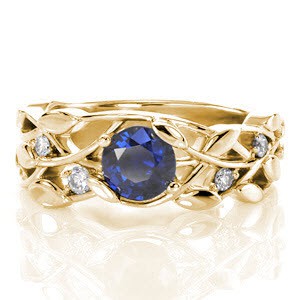 Sapphire engagement ring in Buffalo set within a nature inspired pattern.