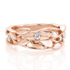 Unique wedding band in Green Bay with nature inspired patterns and diamonds.