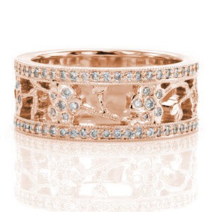 This charming floral band is inspired from the Jinhae Blossom design. The alternating flowers and leaves are outlined on either side by bands of micro pavé. The edges of the outer bands and of the vines are refined with milgrain, a textured finish.