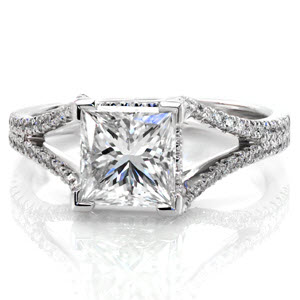 Design 2282 features a 2.00 carat princess cut center diamond in a split shank band. The band is detailed with two rows of micro pavé diamonds that flow smoothly towards the center stone. There are micro pavé diamonds accenting the sides of the center stone setting for that extra opulent touch.