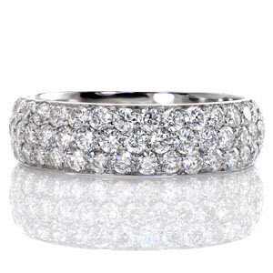 Micro pave wedding ring with three rows of round brilliant diamonds in Orlando.