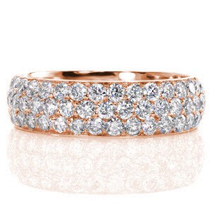 Montreal custom rose gold wide ring with a rounded band and three rows of micro pave diamonds.