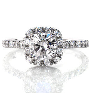 Halo engagement ring in Rochester with cushion cut diamond and cushion shaped halo.