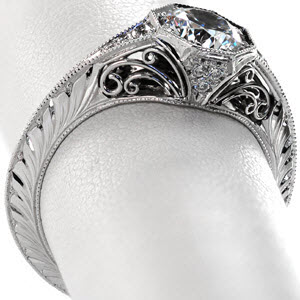 Green Bay engagement ring with hand engraving, filigree and round center stone.
