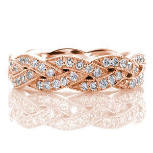 Rose gold wedding band in Boston with a diamond braided pattern outlined in milgrain.