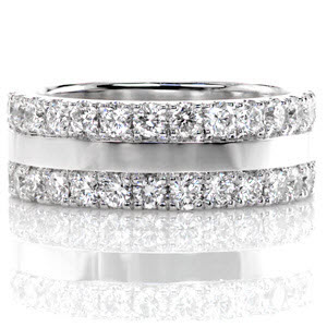 The Vega is a stunning example of modern artistry while utilizing traditional jewelers techniques. Two rows of round cut diamonds totaling 1.63 carats are set with unique split-prongs and U-shaped detailing for maximum sparkle. Crafted in 14k white gold, the lustrous high polished center adds a contemporary flair.