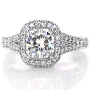 Custom engagement ring in New Haven with a cushion cut center diamond surrounded by a diamond halo and split band.
