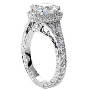 Antique engagement ring in Allentown with cushion cut center stone, filigree and diamond halo.