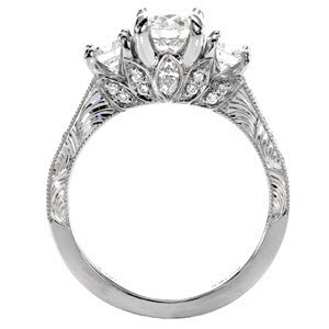 Virginia Beach antique engagement ring with hand engraving in a three stone setting.