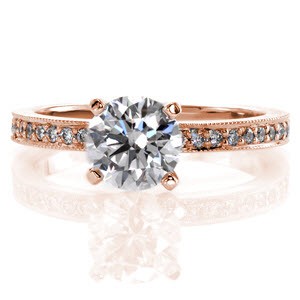 Euro Pave Petite is a classically gorgeous ring in 14k white gold that gracefully holds the 1.00 carat round brilliant center stone. The shank is adorned with a single delicate row of micro pavé diamonds. A modern twist is the Euro shank detail at the bottom that adds comfort and reduces turning. 