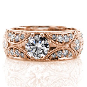 Our North Star design features a .50 carat round center stone set within a delicate eight prong setting. The design is accentuated with micro pavé diamonds that are hand cut within antique inspired crescent shapes. The design is framed with milgrain detail for additional sparkle. 