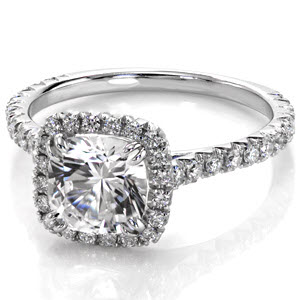 Madison custom engagement ring with a micro pave diamond halo and slim band holding a cushion cut diamond center.