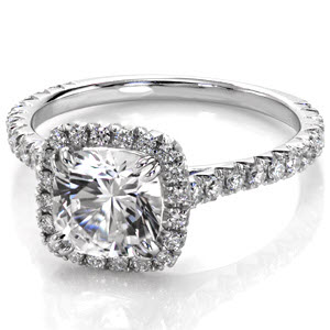 Las Vegas custom engagement ring with a micro pave diamond halo surrounding a cushion cut center diamond.