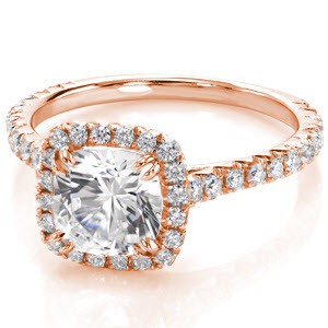Detroit rose gold custom engagement ring with a micro pave diamond halo surrounding a cushion cut center diamond.