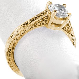Washington D.C. filigree engagement ring with round brilliant center stone, hand engraving and milgrain.