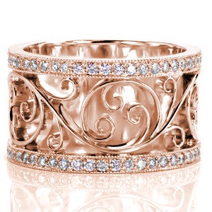 Rose gold wedding band in Philadelphia with flowing filigree framed by micro pave diamond bands.